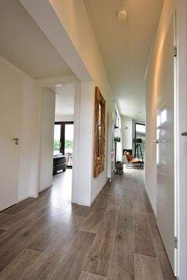 ferienhaus-kaufen-herkingen-wohnzimmer-esszimmer-2025.webp07