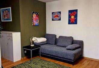 Wohnnische mit ausziehbarer Couch