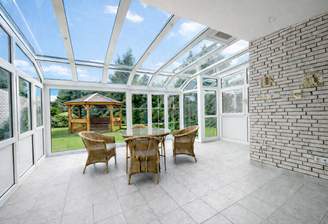 EG Wintergarten mit Gartenblick und Gartenzugang