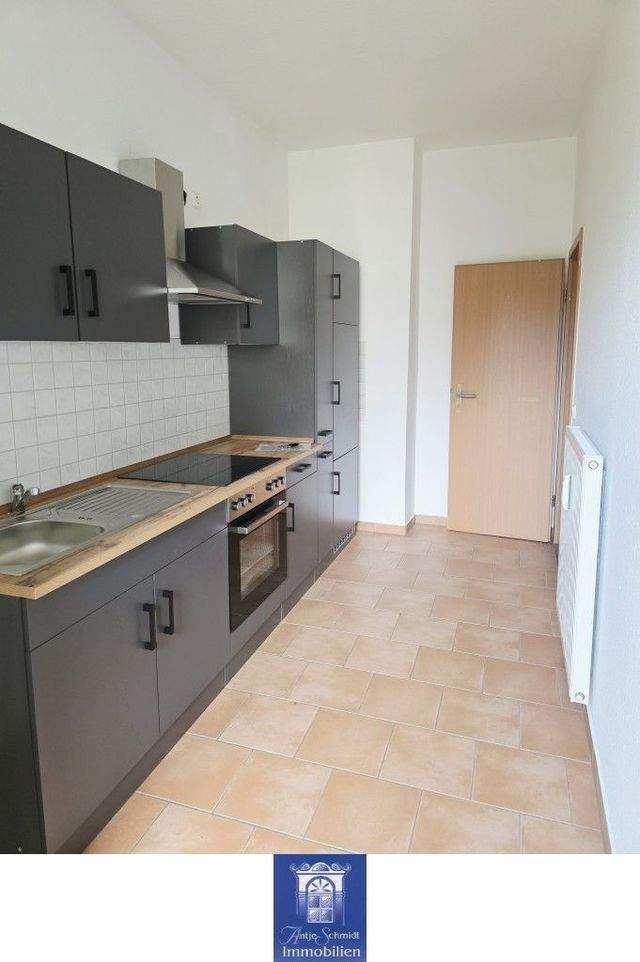 Bezaubernde Wohnung mit Einbauküche und Balkon! - Foto 2