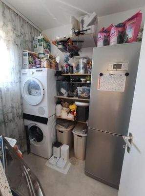 Offene Küche mit 2 Abstellräumen (mit Anschluss für Waschmaschine und Trockner) Bild 4