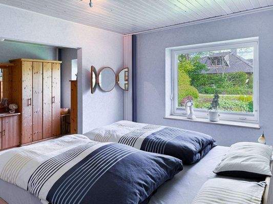 Schlafzimmer mit Ankleidezimmer