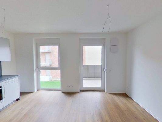 Ansicht III: Wohn- und Esszimmer mit offenem Küchenbereich