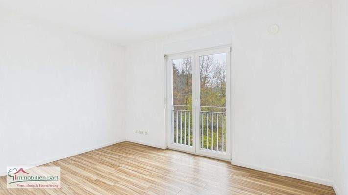 Schlafzimmer mit Blick ins Grüne