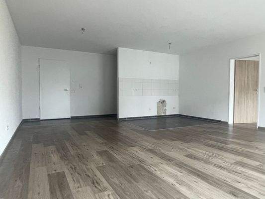 Wohnzimmer mit Küche