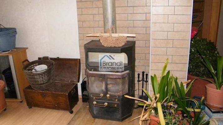 Zimmer mit Kaminofen