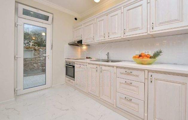 Von der Küche gelangen Sie auch direkt in den Garten