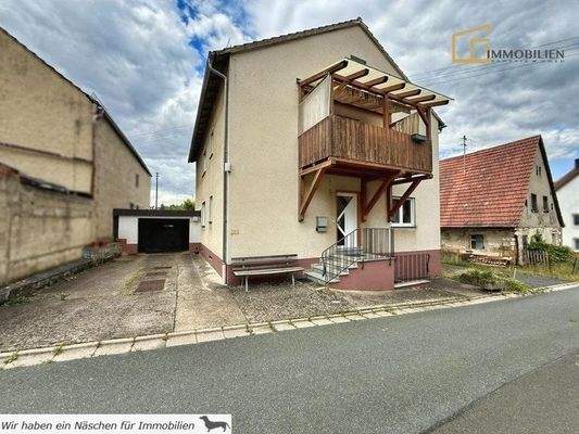 Süd-Ansicht Garage,Gebäude und Altbestand