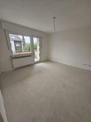 Wohnzimmer mit Balkon