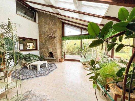 Wintergarten mit Zugang zum Garten