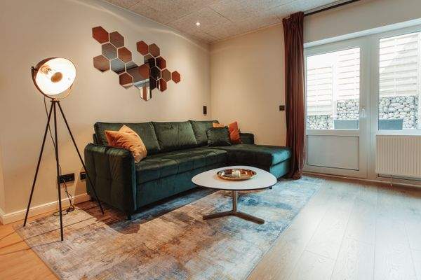 Wohnzimmer Souterrainwohnung