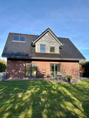 Blick aus dem Garten - Großzügige Doppeltüren zur Terrasse