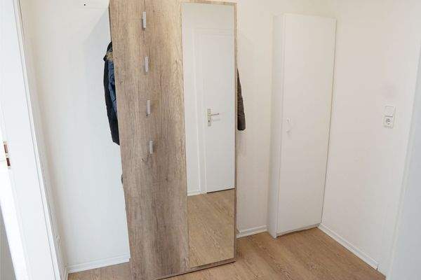 Die Garderobe im Erdgeschoss, Wohnhaus