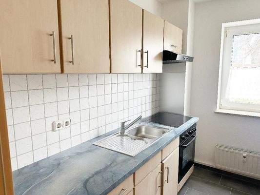 Küche mit Einbauküche