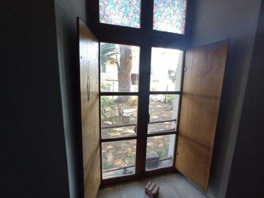 Kreta, Neapoli: Großes Steinhaus mit unvollendetem Gästehaus, Olivenhain und Garten zu verkaufen