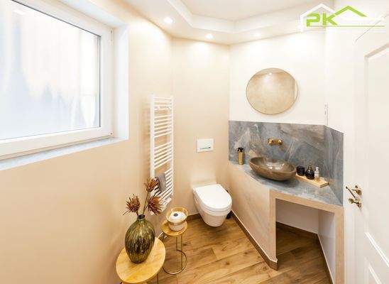 WC im Erdgeschoss (mit vorbereitetem Anschluss für Dusche)