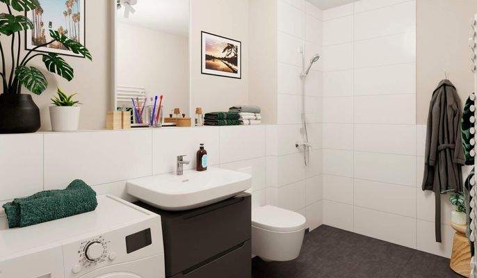 Das Badezimmer enthält eine bodengleiche Dusche