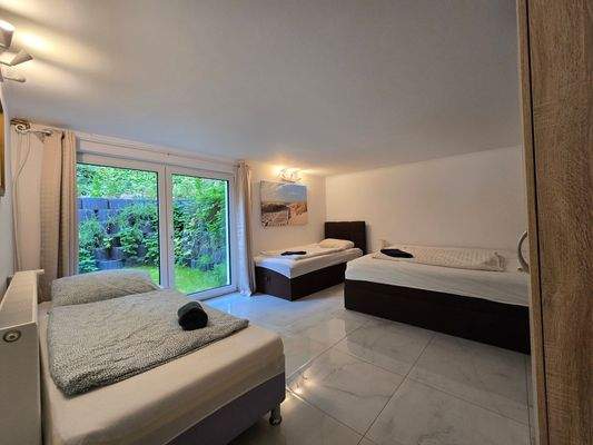 UG Maison Immobilien Bungalow Buchholz Schlafzimmer 2