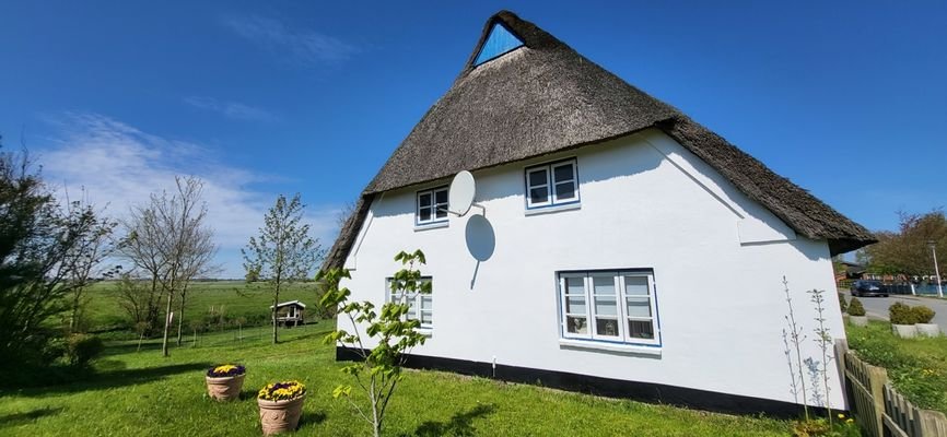 Stirnseite mit Gartenblick