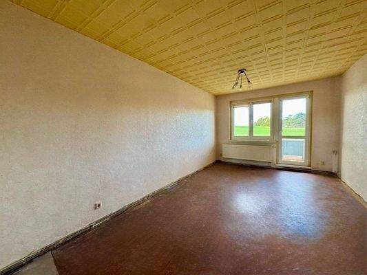 Wohnzimmer mit Balkon