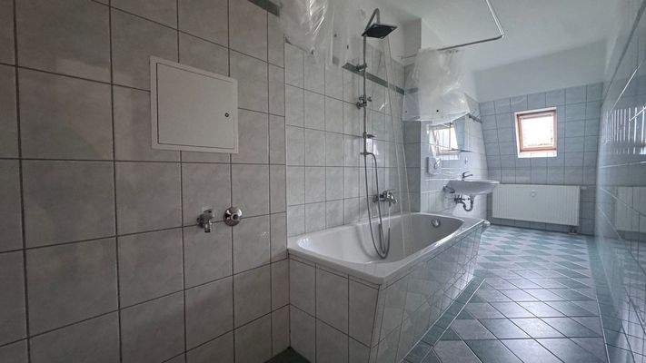 Badezimmer mit Waschmaschinenanschluss