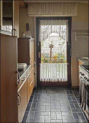 Hinterhaus: Gemütliche Küche mit Terrassenzugang