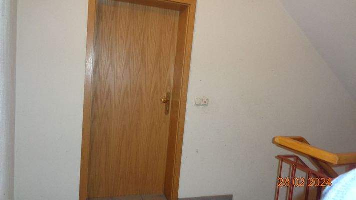 Treppenhaus Eingang zur Wohnung.JPG
