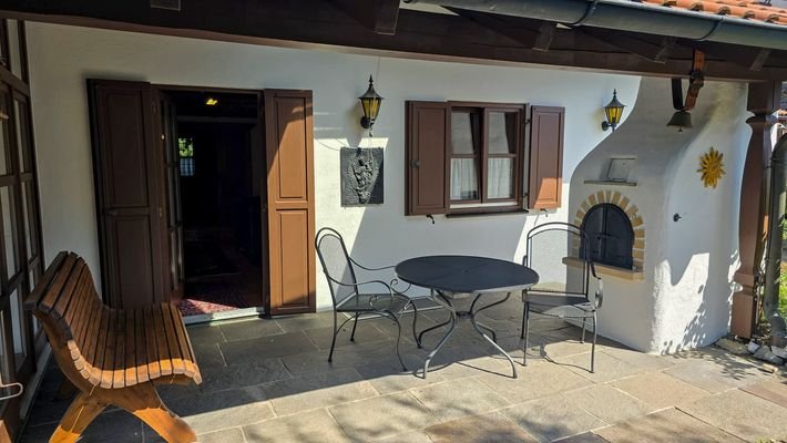 Veranda mit Pizzaofen