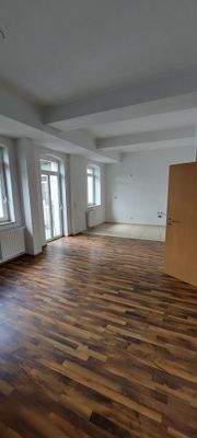 Wohnzimmer mit Küche