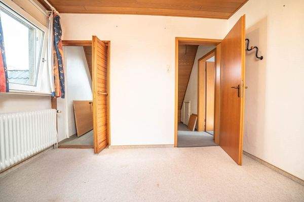 Schlafzimmer 2 DG (WE 1)