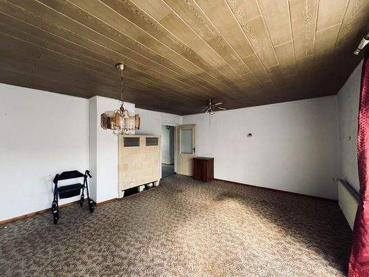 Wohnzimmer EG mit Kachelofen