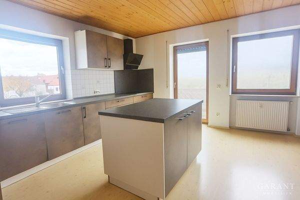 Moderne Küche mit natürlichen Holzelementen