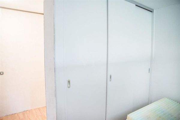 Schlafbereich mit integriertem Kleiderschrank