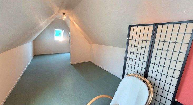 Zimmer im Spitzboden