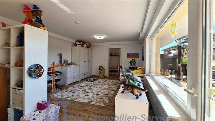 Foto 35_Wohn-Spielzimmer.JPG