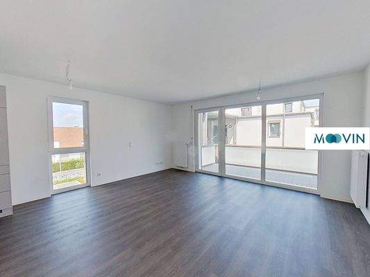 Ansicht I: Wohn- und Esszimmer mit offenem Küchenbereich