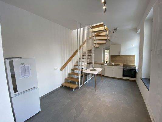 Treppe ins obere Geschoss