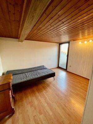 Innen_OG_Kinder--Gästezimmer mit Terrasse.jpeg