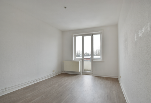 Wohnzimmer mit Balkon