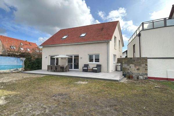 Illustration mit Beispielhaus