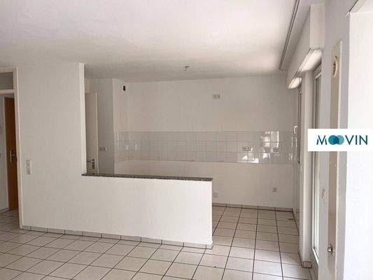 Ansicht II: Wohn- und Esszimmer mit offenem Küchenbereich