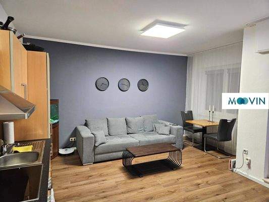 Ansicht III: Wohn- und Esszimmer mit offenem Küchenbereich