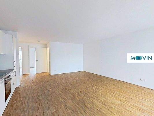 Ansicht IV: Wohn- und Esszimmer mit offenem Küchenbereich