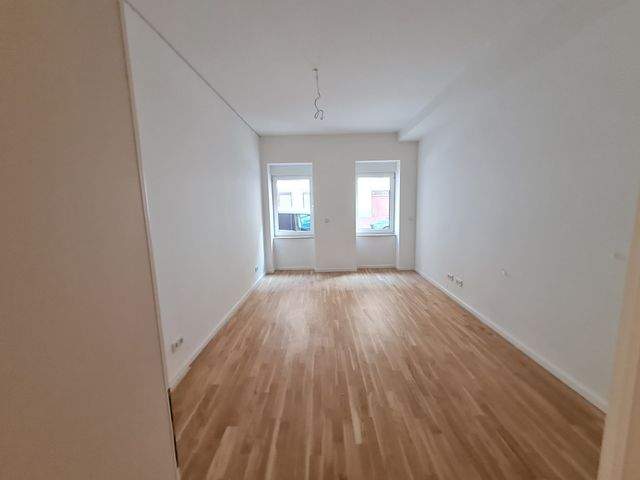 Schicke 2-Zimmerwohnung mit Parkett und Terrasse und guter Energieeffizienz - Foto 2