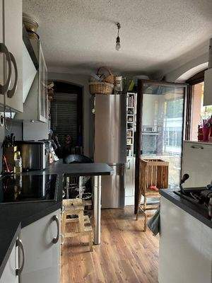Küche im OG mit schönen Holzdielen und kl. Balkon