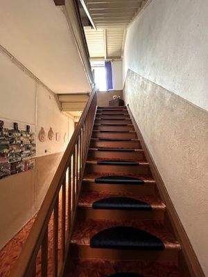 Treppe zur Wohnung im OG