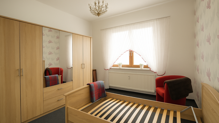 Wohnung 1: Schlafzimmer