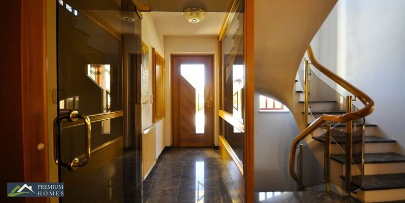 KUNDL - Einfamilienhaus - Eingangsbereich mit Glaselementen