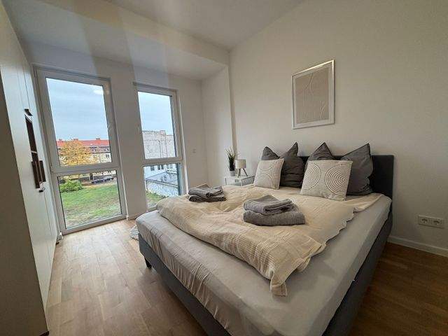Erstbezug nach Sanierung - Vollmöblierte 2-Zimmer mit Parkett, Balkon, EBK, Fußbodenh. u. Belüftungsanlage - Photo 5
