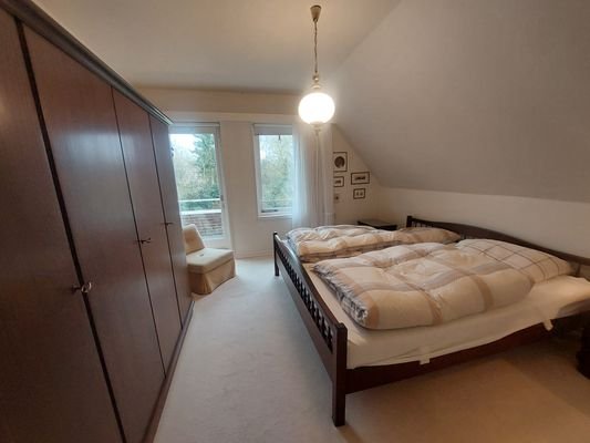 Schlafzimmer mit Balkon